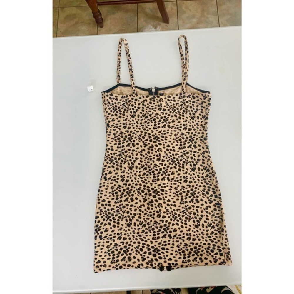 Bundle of 2‎ Animal Print. Mini Dress Size 10 & Leopard print Jumpsuit Small - Picture 12 of 13
